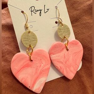 Handmade marbled clay earrings. Big pink heart dangle with gold embellishment
